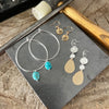 July earrings